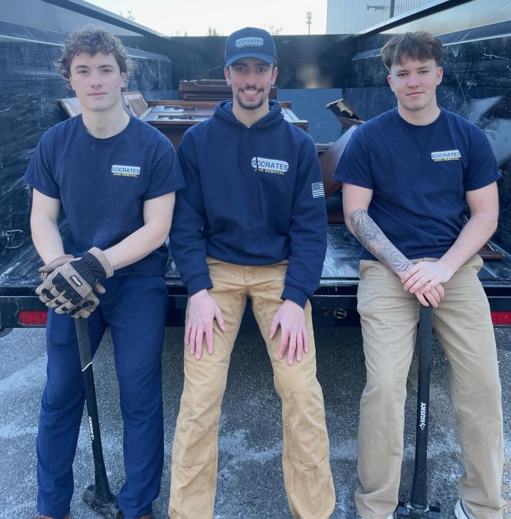 socrates junk removal team in wayne pa after successful junk removal job with debris in trailer