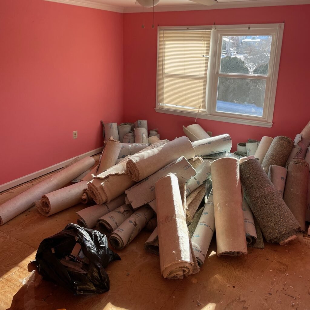 carpet removal old carpet rolled up and removed from residential room in wayne pa
