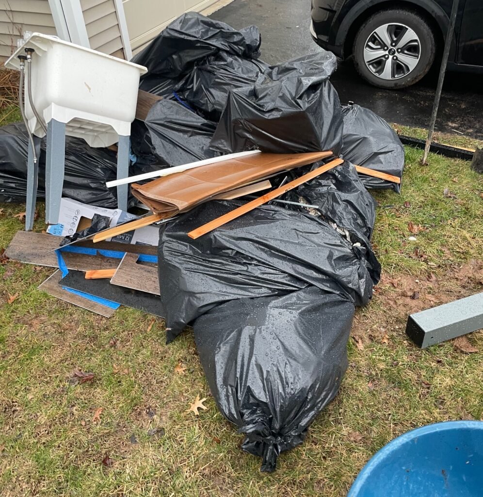 pile of bulk trash waiting for pickup outside