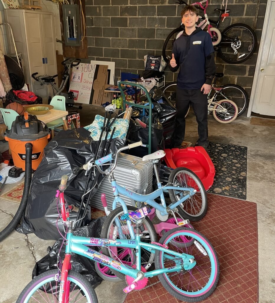 garage cleanout with clutter and junk ready for removal
