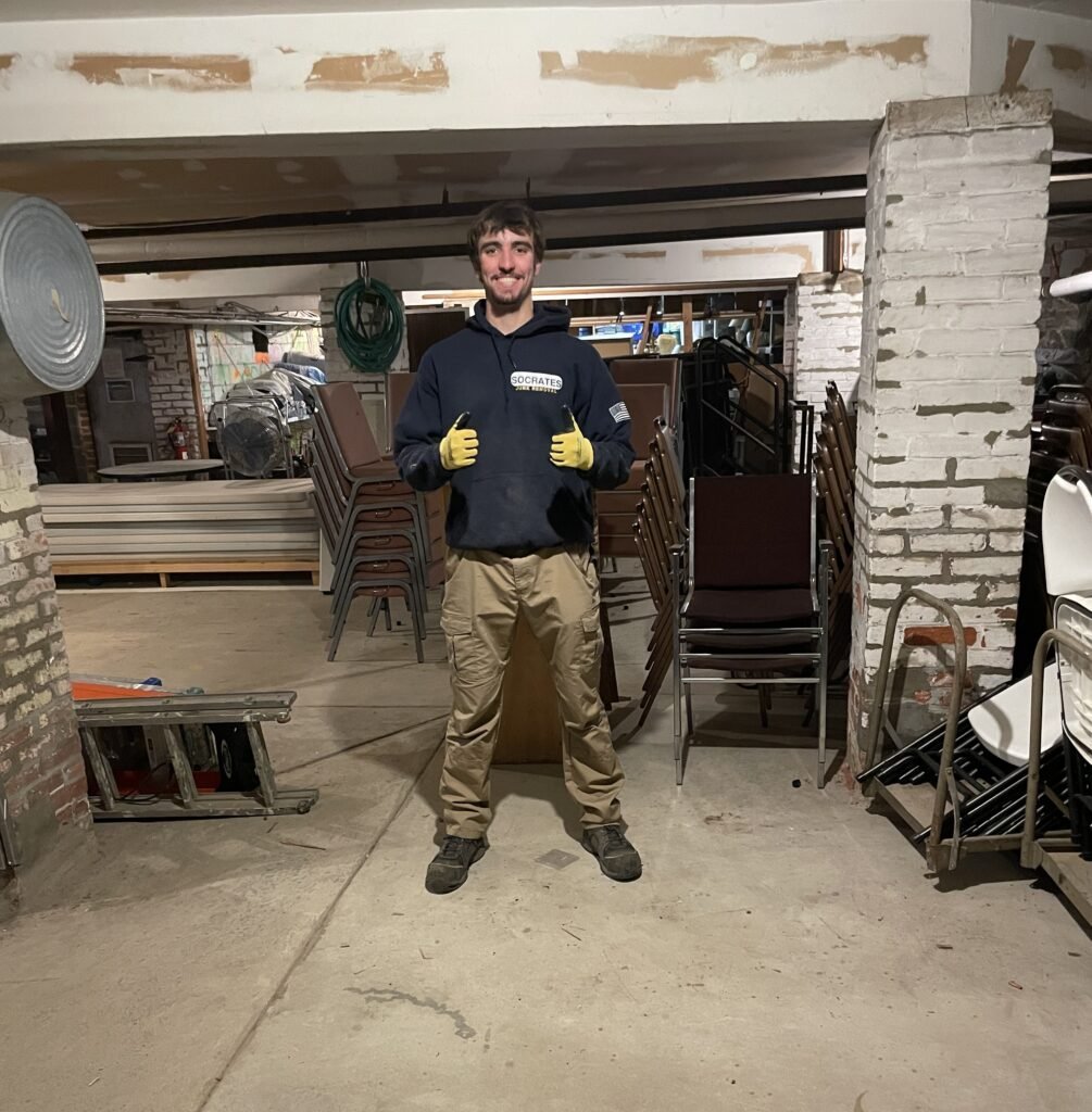 Socrates Junk Removal performing basement cleanout, removing junk and debris in Wayne