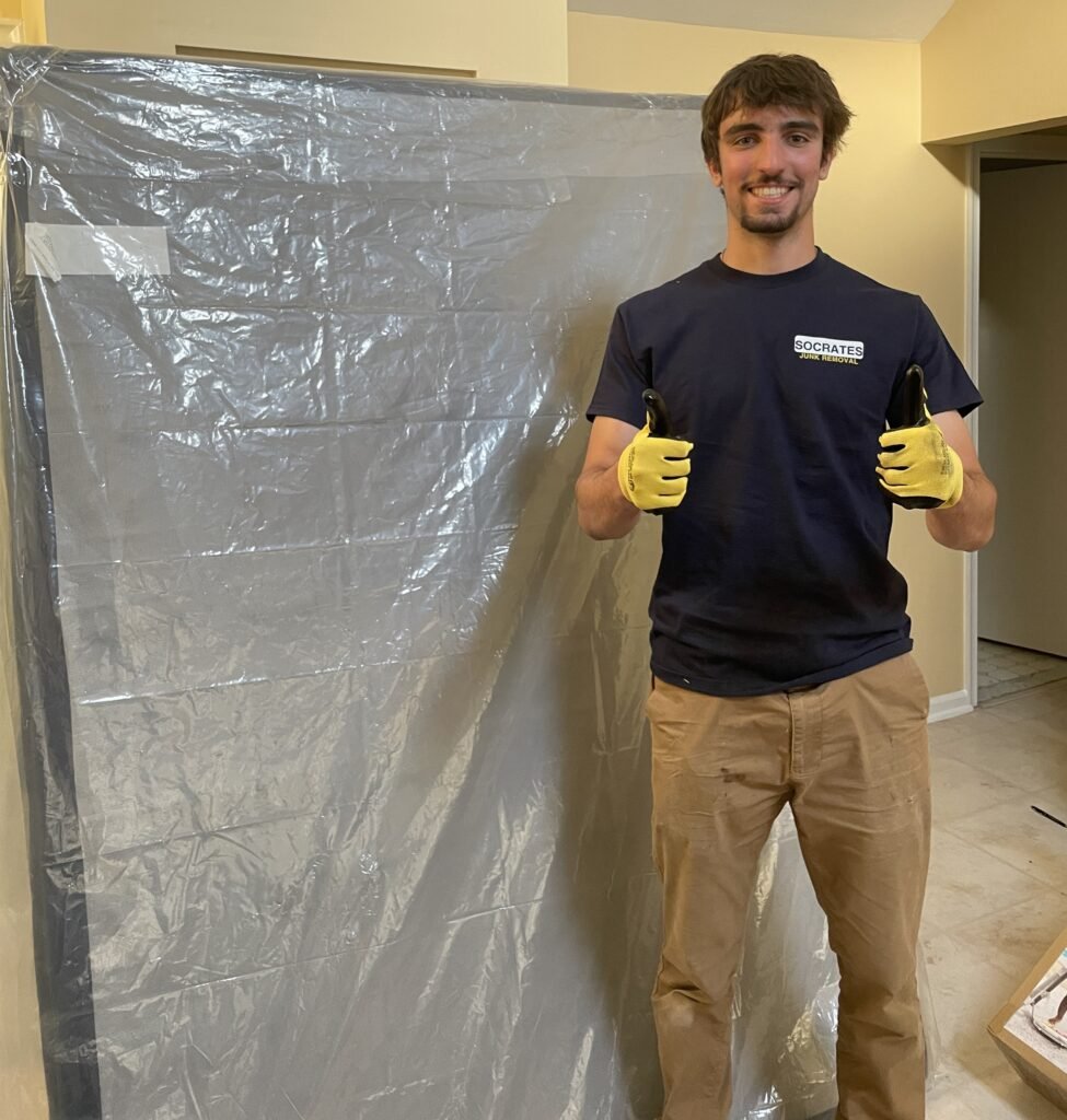 Socrates Junk Removal providing mattress removal service, safely removing and hauling away a mattress in Malvern