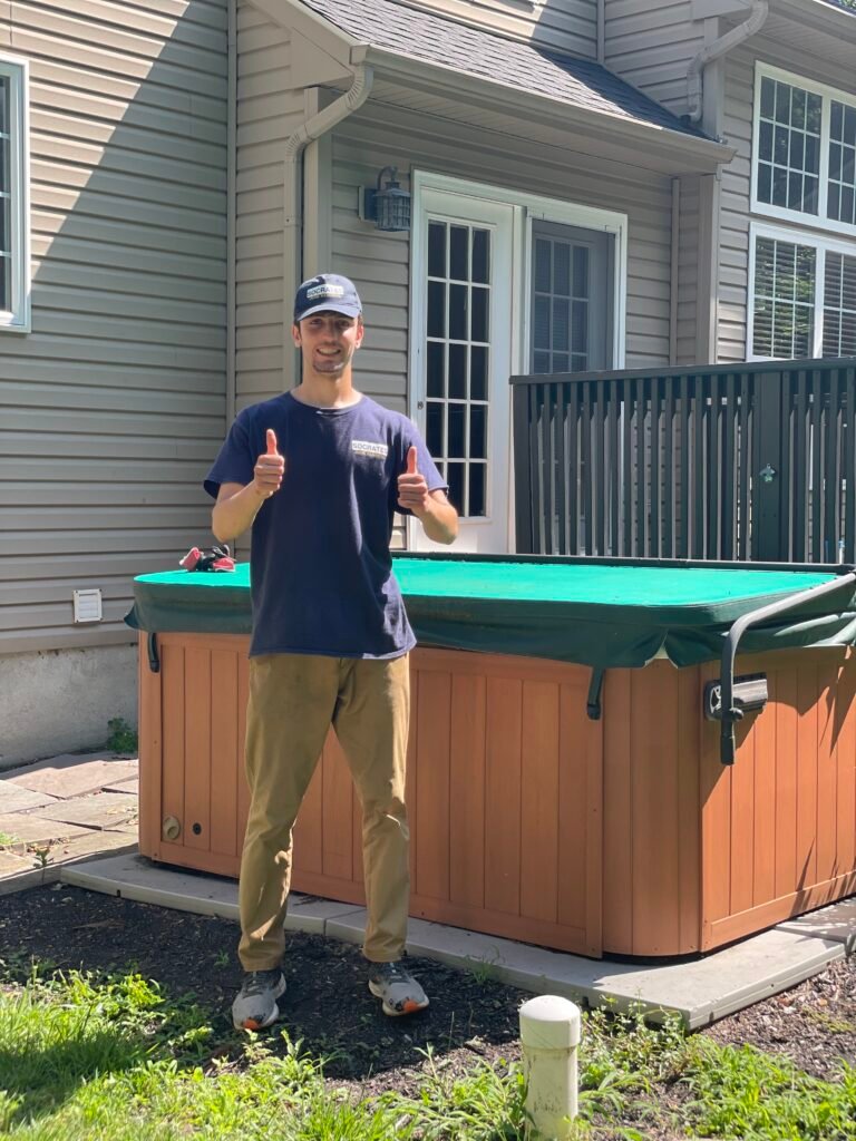 socrates junk removal owner at property during hot tub removal job