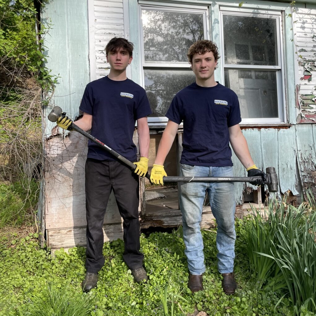 Junk Removal team in Broomall PA with furniture and household items ready for hauling