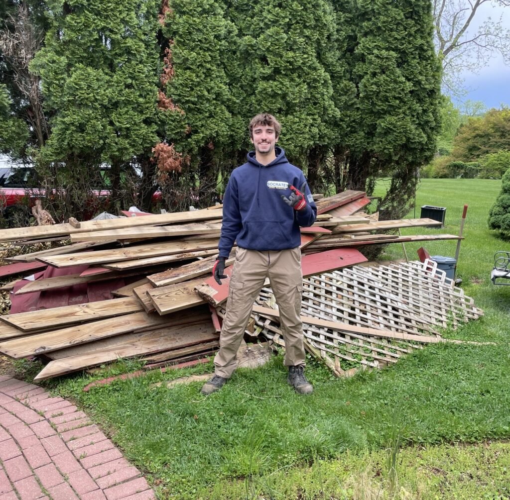 Backyard cleanup and wood debris removal in Chesterbrook PA by Socrates Junk Removal